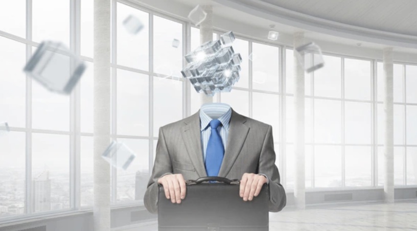 Executive with a head made of glass blocks — a metaphor for headless architecture